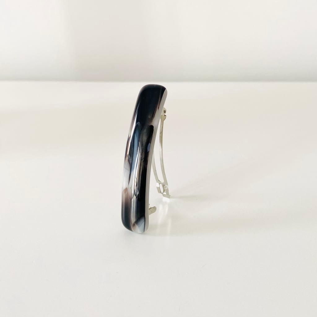 Barrette en verre noire et blanche